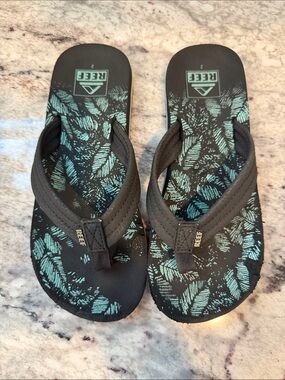 Reef Black Flip Flops with Teal Leaf Print